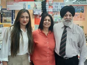 Netherton postmaster Sukhdev Singh and his wife Narinder Kaur who are to retire. Pictured to the left of them is the new postmistress, Mandip Kaur Wallace.
