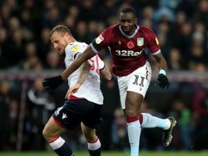 Bolton Wanderers' David Wheater (left) and Aston Villa's Yannick Bolasie battle for the ball.