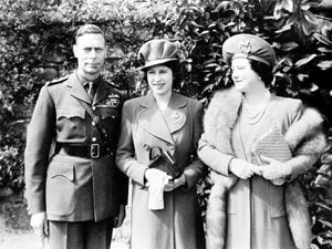 Queen Elizabeth (later the Queen Mother) and King George VI with their daughter Princess Elizabeth (later Queen Elizabeth II), who will shortly celebrate her 18th birthday