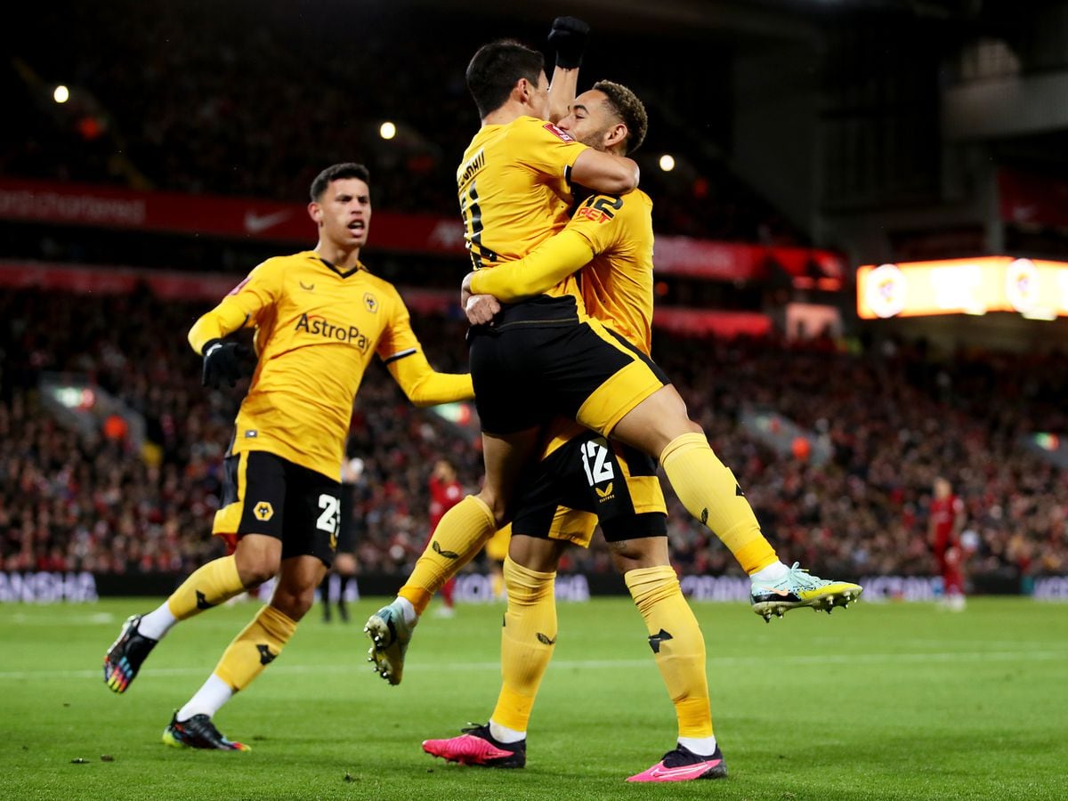 Hee-chan Hwang of Wolverhampton Wanderers celebrates after scoring his team's second goal with Matheus Cunha (Photo by Jack Thomas - WWFC/Wolves via Getty Images).