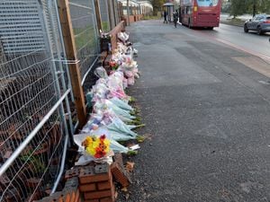 SANDWELL COPYRIGHT TIM STURGESS EXPRESS AND  STAR...... 22/11/2022   Flowers at the scene where a blue Nissan Skyline hit a number of pedestrians who had gathered on the A457 Birmingham Road and Oldbury Road near to the junction with Crystal Drive....