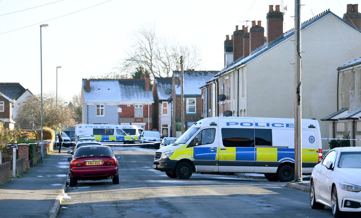 Police at Cook Street, Wednesbury, after the 18-year-old was stabbed to death