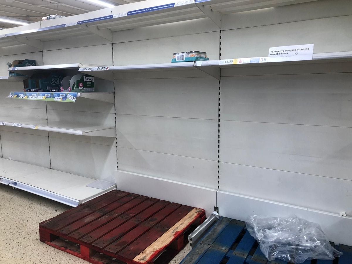 Empty shelves where toilet roll should be at Tesco in Willenhall on Tuesday