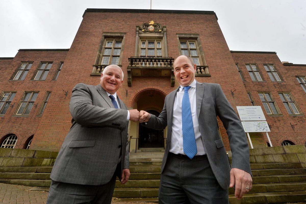 Dudley Council leader Patrick Harley and Eton headmaster Simon Henderson check out the Express & Star's coverage of the new Dudley sixth form