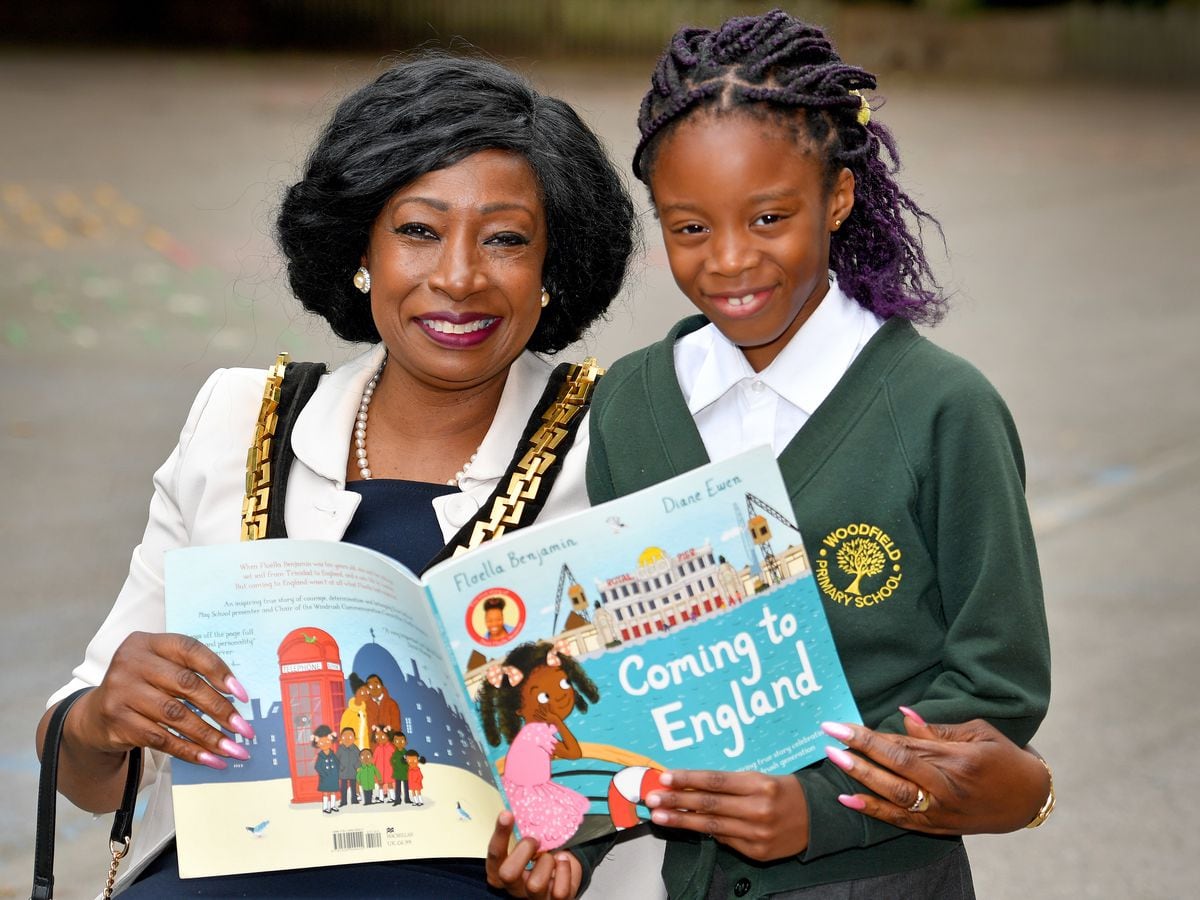WOLVERHAMPTON COPYRIGHT MNA MEDIA TIM THURSFIELD 04/07/22.Mayor of Wolverhampton Cllr Sandra Samuels visited Woodfield Primary School, Penn, to see what the children had been learning about the history of Windrush. She is pictured with seven year old Gabriela Omosigho....