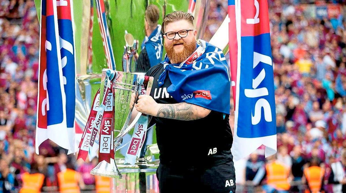 Butler with the Championship play-off final trophy at Wembley