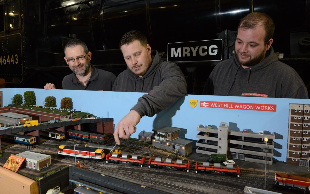 Dave Bower, Chris Bower and Phil Proctor with their layouts