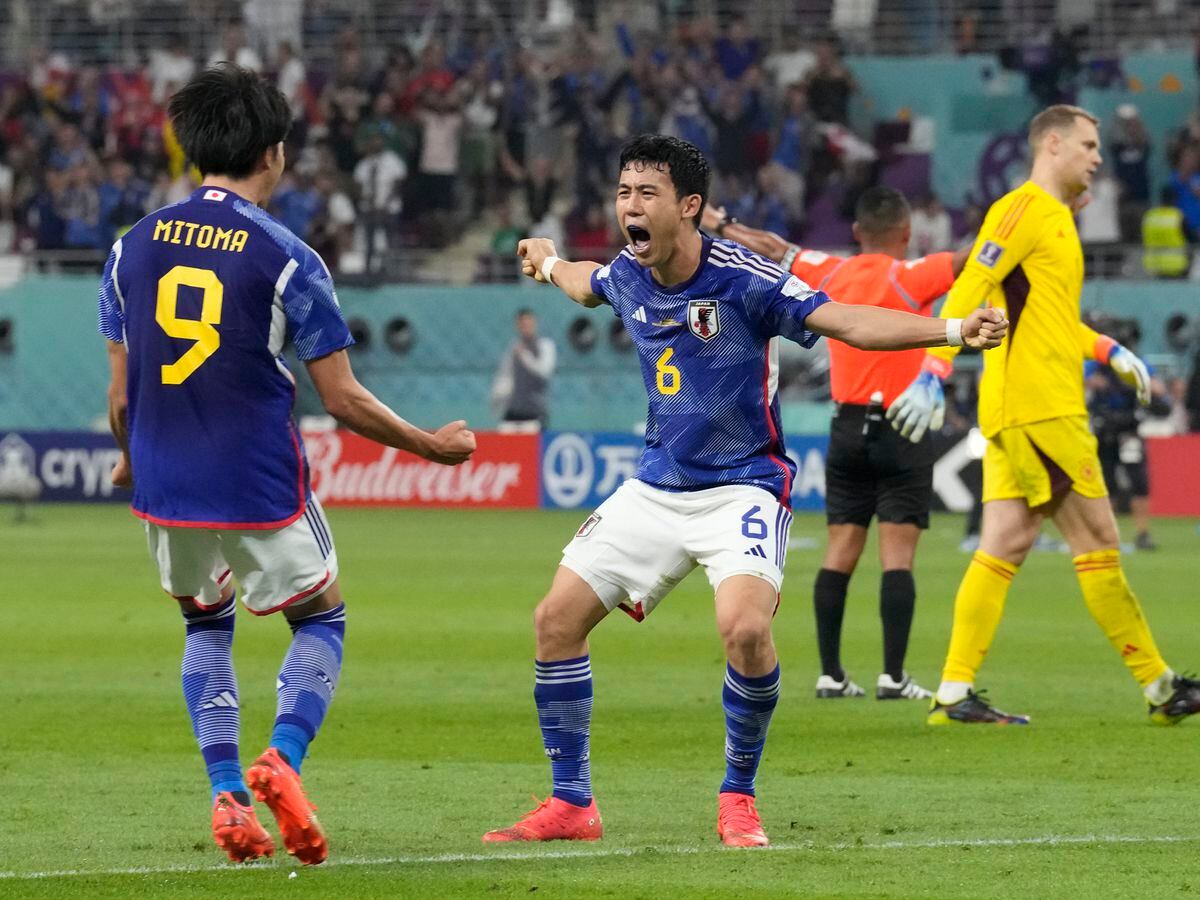 The pair predicted Japan's shock win over Germany (AP Photo/Eugene Hoshiko).