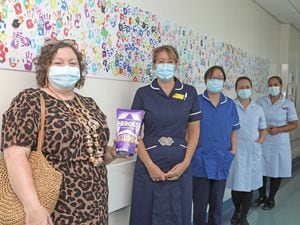 Angie Fleming with staff at New Cross Hospital