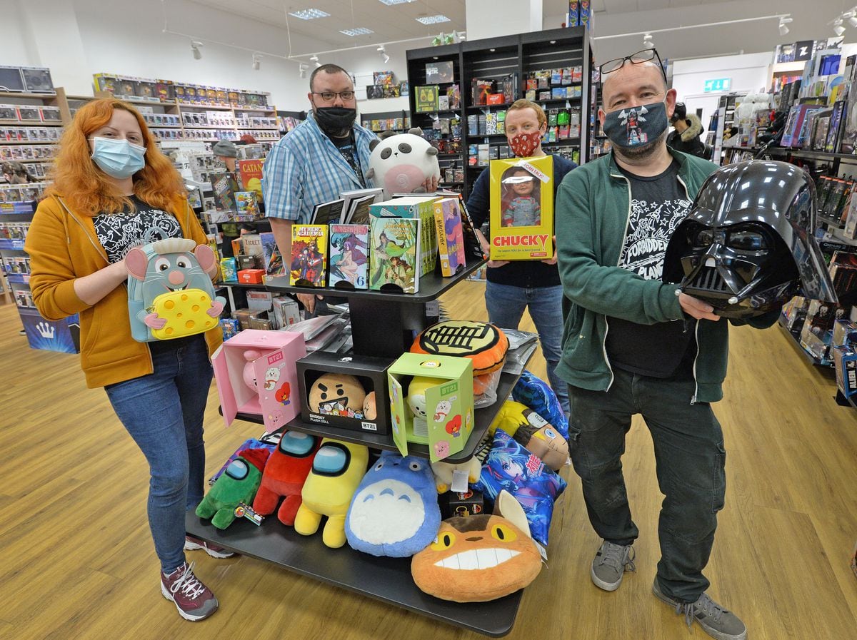 Emma Parton, Adam Langston, Simon Mole and Chris Ball show off some of the items on sale