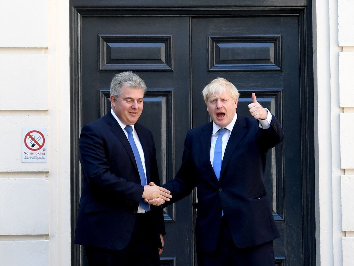 Boris Johnson (right) with Conservative party chairman Brandon Lewis