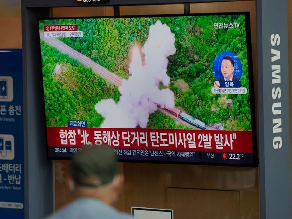 A TV screen showing a news program reporting about North Korea’s missile launch with file footage, is seen at the Seoul Railway Station in Seoul, South Korea