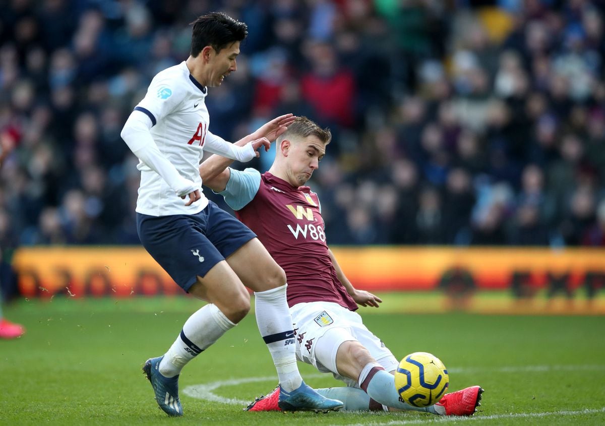 Tottenham Hotspur's Son Heung-min (left) and Aston Villa's Bjorn Engels battle for the ball 