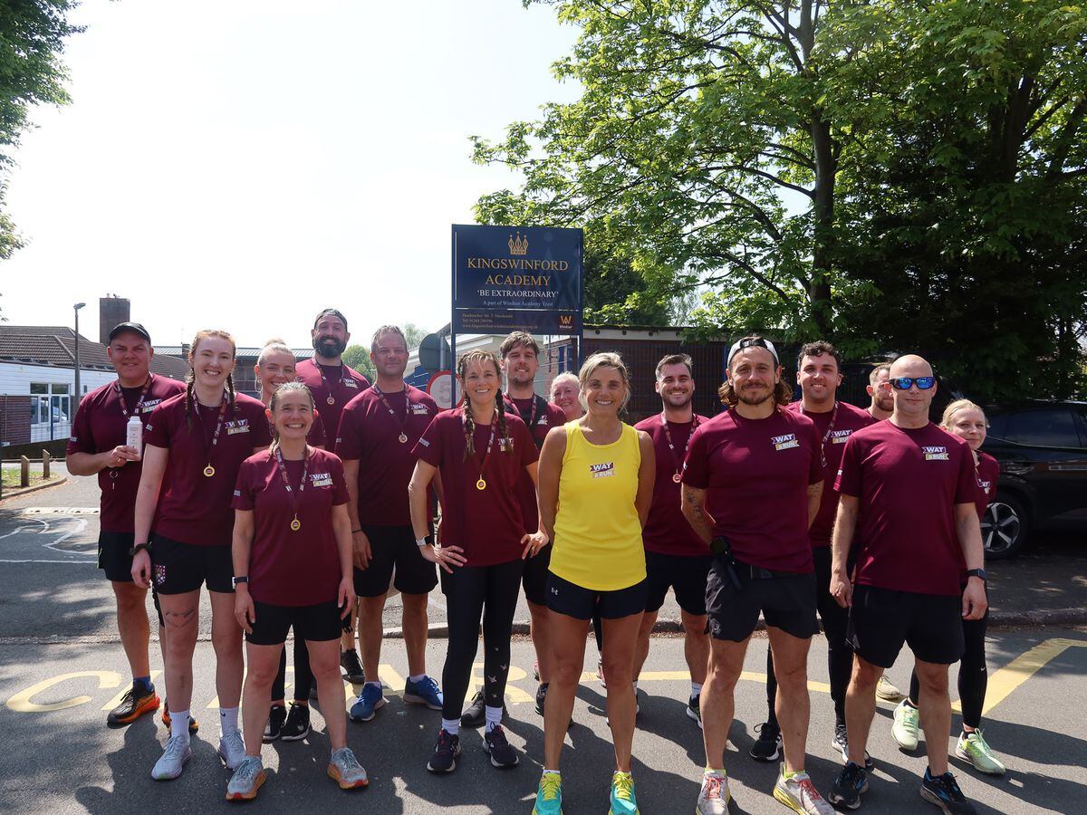 The runners pose outside Kingswinford Academy