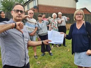 Resident Manoj Prakash and Councillor Diane Coughlan with other residents and a petition against a 5G mast in Clarkes Lane. Picture by: Diane Coughlan