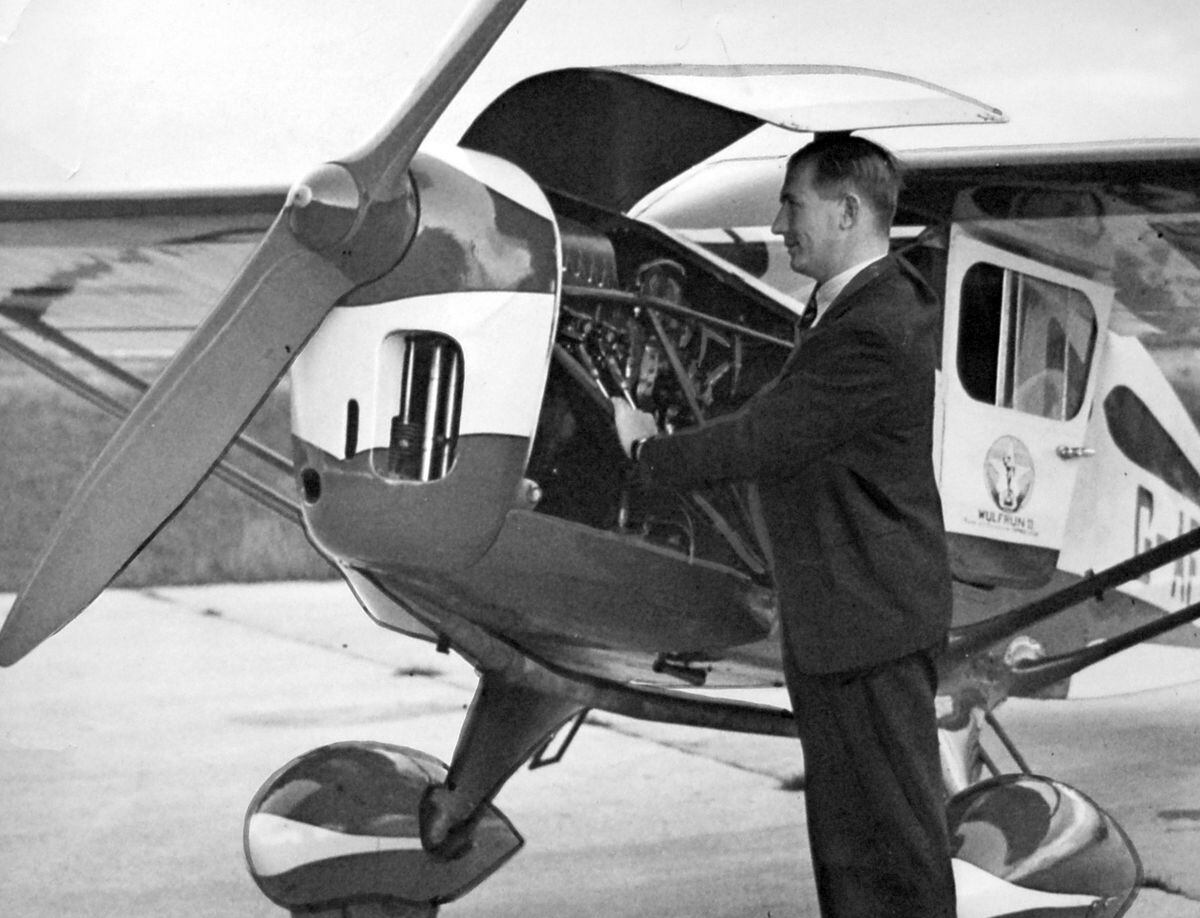 Mr Mitchell, instructor of the Midland Aero Club at Wolverhampton aerodrome, inspects the new arrival in November 1938.