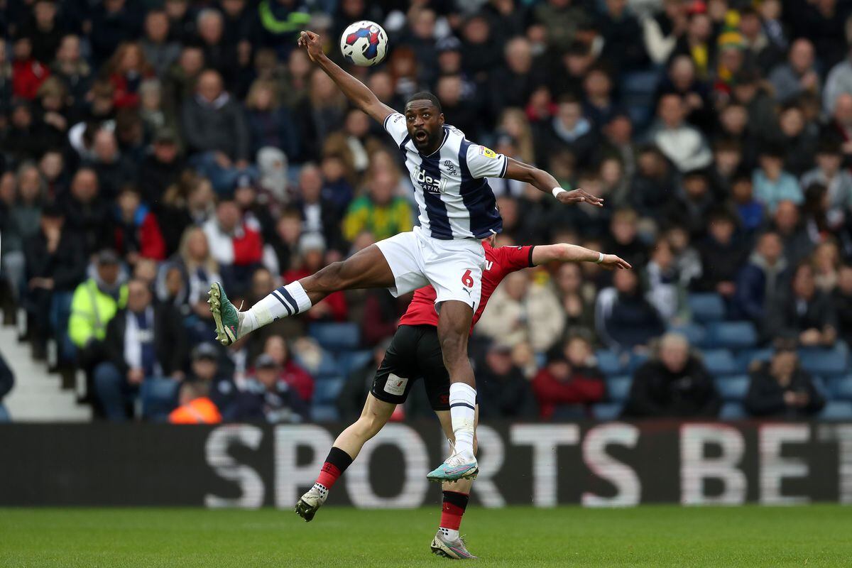Semi Ajayi of West Bromwich Albion and Tom Bradshaw of Millwall (Photo by Adam Fradgley/West Bromwich Albion FC via Getty Images).