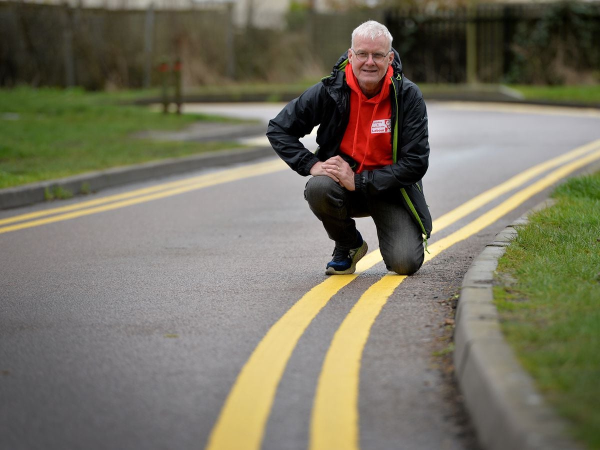 See them while you can! Councillor Richard Body with the mistaken yellow lines in Homer Hill Park