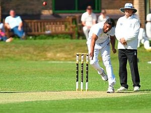Smethwick quick bowler Yaser Ali on his way to taking two wickets for 34  at Shrewsbury    Picture: Paul Devine 