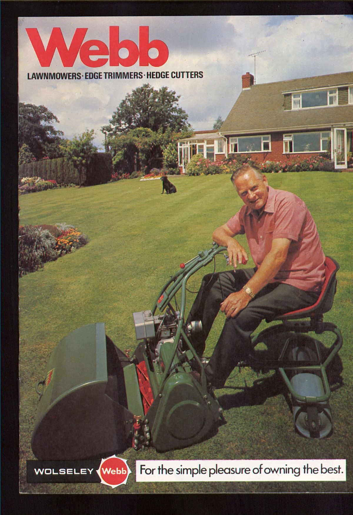 Riding high on the cover of a lawnmower catalogue.