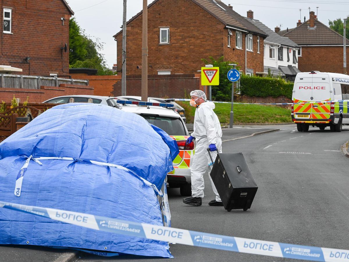 Police at the scene of the alleged stabbing in Suffolk Road, Wednesbury. Photo: SnapperSK.
