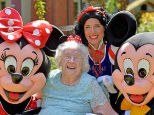 Resident Margaret Robinson with Pippa Langhorne as Snow White with Micky and Minnie