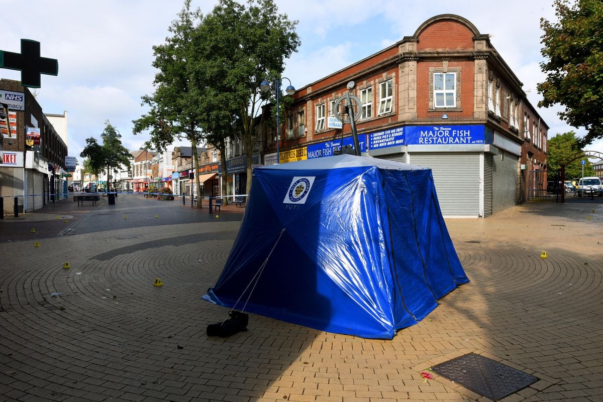 A police tent near the Horse & Jockey pub
