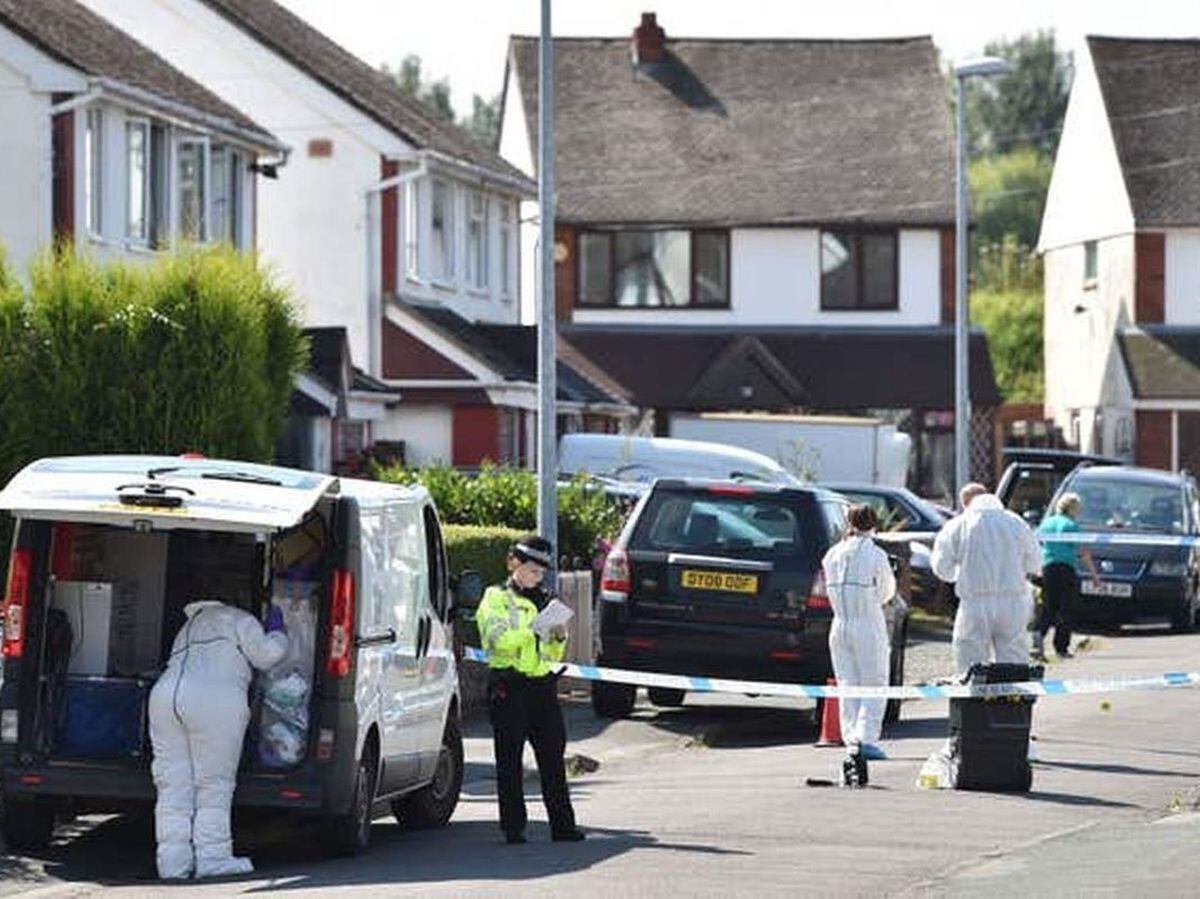 Forensic teams at the scene in Meadow Close, Telford, in August 2016