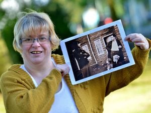 Joanne Smith with the picture she found of herself as part of the 'Forgotten People' photos from The Scotlands Estate. She is on there as a child with her brother and Dad: Malcolm and Henry