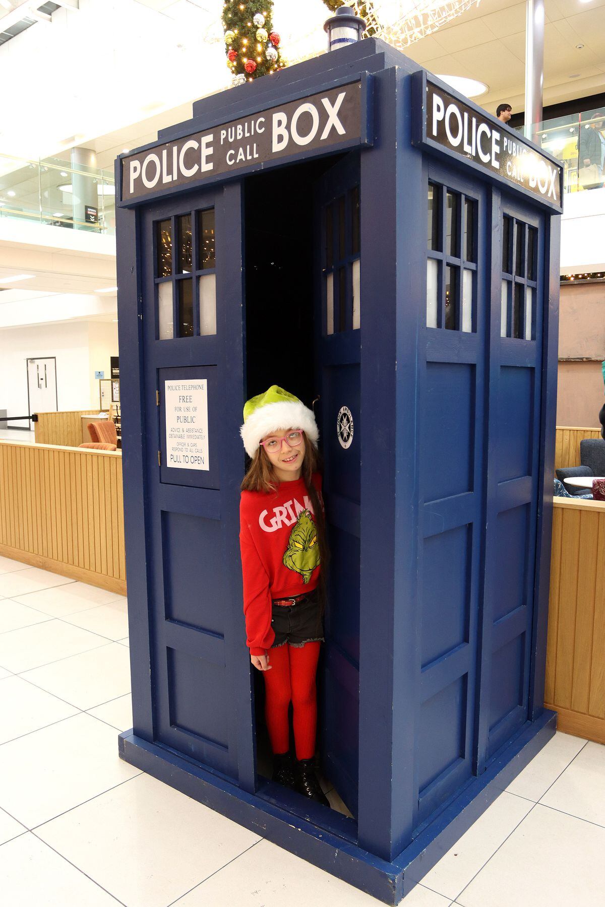 Marnie Thomas, nine, checks out the Tardis from Doctor Who