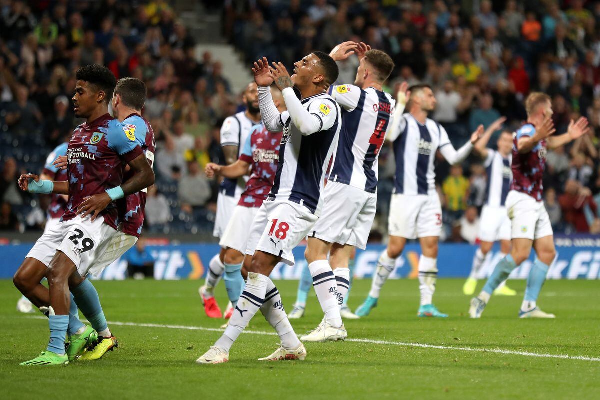 Karlan Grant of West Bromwich Albion and other players react after Jed Wallace of West Bromwich Albion shot hits the post during the Sky Bet Championship between West Bromwich Albion and Burnley at The Hawthorns on September 3, 2022 in West Bromwich, United Kingdom. (Photo by Adam Fradgley/West Bromwich Albion FC via Getty Images).