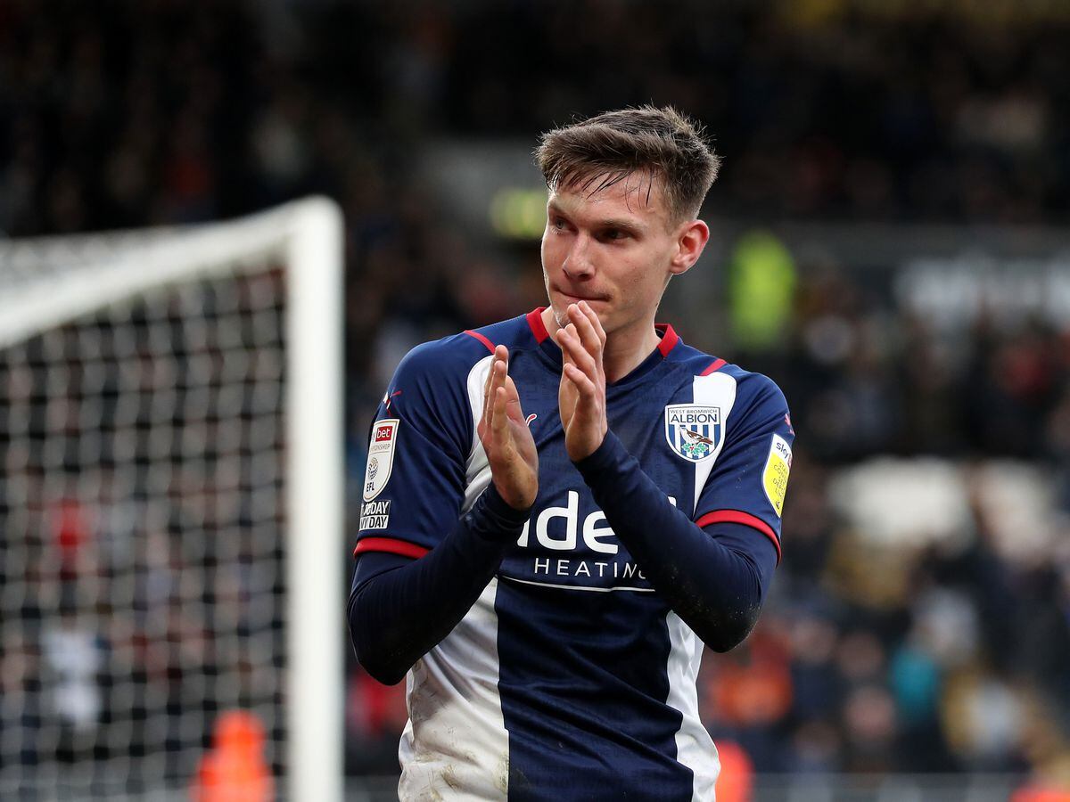 Taylor Gardner-Hickman of West Bromwich Albion applauds the travelling West Bromwich Albion Fans at the final whistle during the Sky Bet Championship match between Hull City and West Bromwich Albion at MKM Stadium on March 5, 2022 in Hull, England. (Photo by Adam Fradgley/West Bromwich Albion FC via Getty Images).