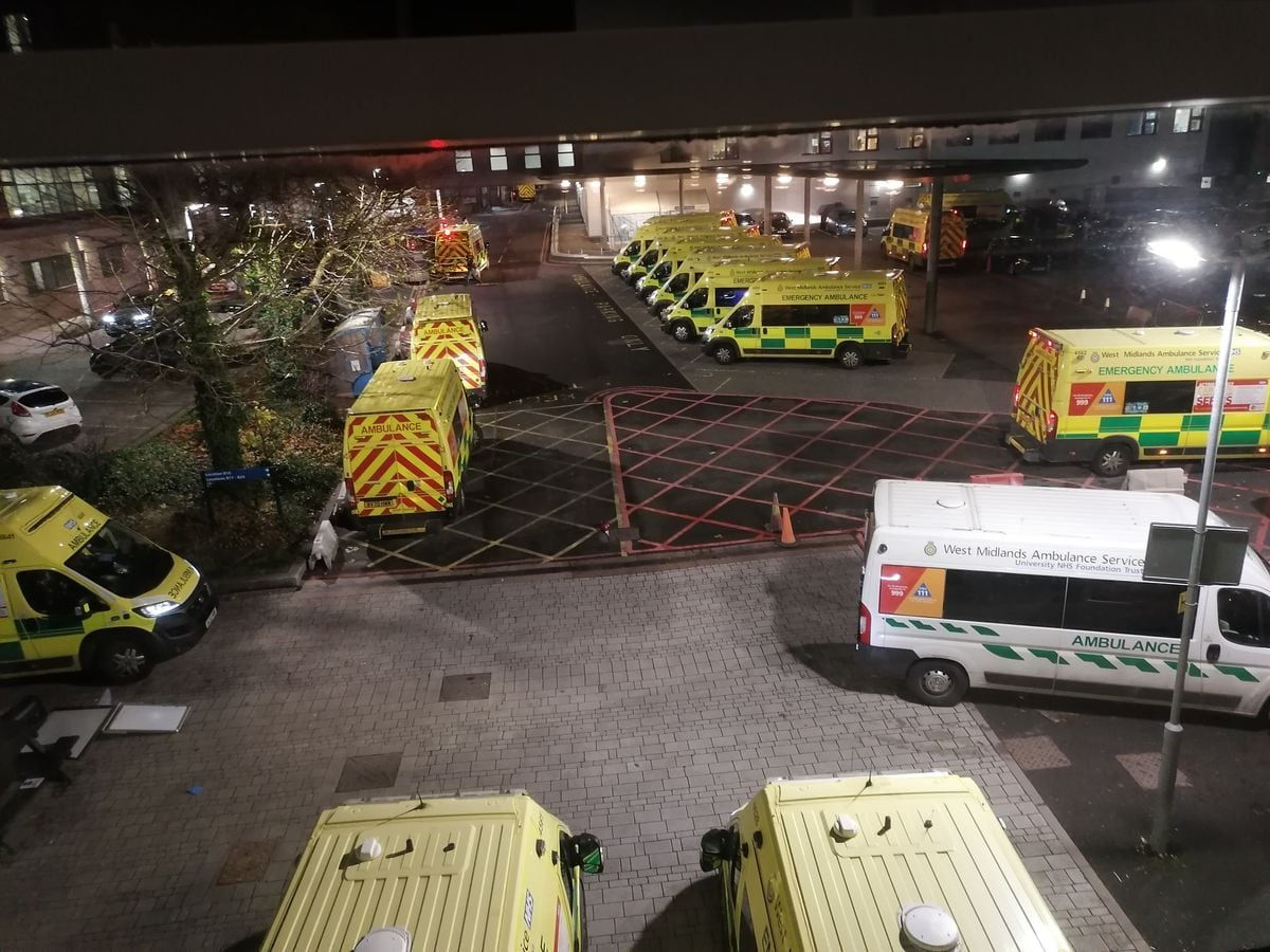 Ambulances waiting outside New Cross Hospital in Wolverhampton on Friday. At one point there were 19 ambulances waiting.