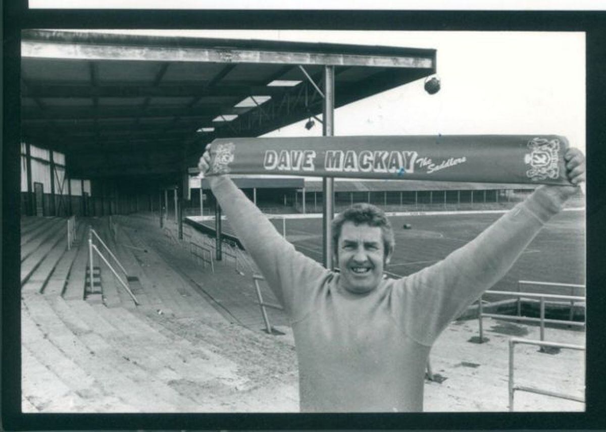 Walsall manager Dave Mackay brandished a scarf bearing his name when pictured in March, 1977