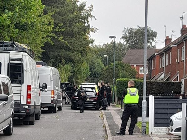 Police at the scene in Sneyd Lane in Bloxwich