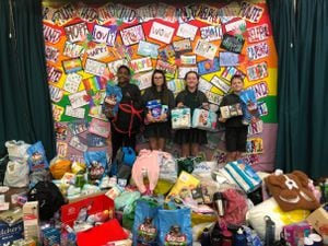 Year 6 children from Hill West Primary School pictured with some of the donations to the ATLP Ukrainian Appeal.