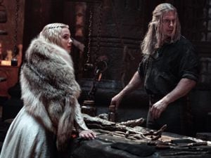 The Witcher - Season 2. Pictured: Freya Allan as Ciri and Henry Cavill as Geralt of Rivia