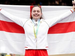 England's Sophie Capewell celebrates on the podium with the silver medal after the Women's Keirin Finals 1-6 at Lee Valley VeloPark on day four of the 2022 Commonwealth Games in London. Picture date: Monday August 1, 2022.