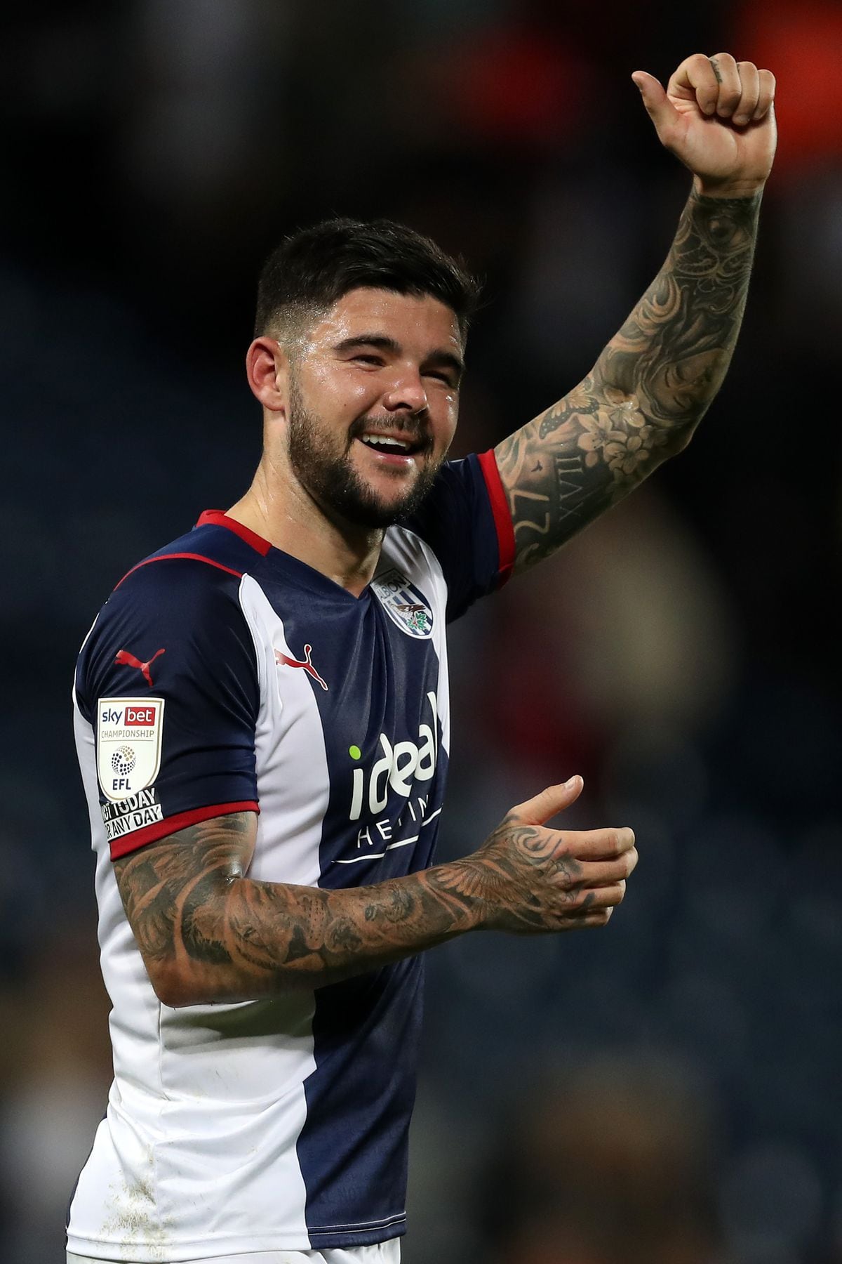 WEST BROMWICH, ENGLAND - SEPTEMBER 25: .Alex Mowatt of West Bromwich Albion fist-pumps the West Bromwich Albion Fans at the end of the match as he celebrates the 2-1 win in the Sky Bet Championship match between West Bromwich Albion and Queens Park Rangers at The Hawthorns on September 25, 2021 in West Bromwich, England. (Photo by Adam Fradgley/West Bromwich Albion FC via Getty Images).