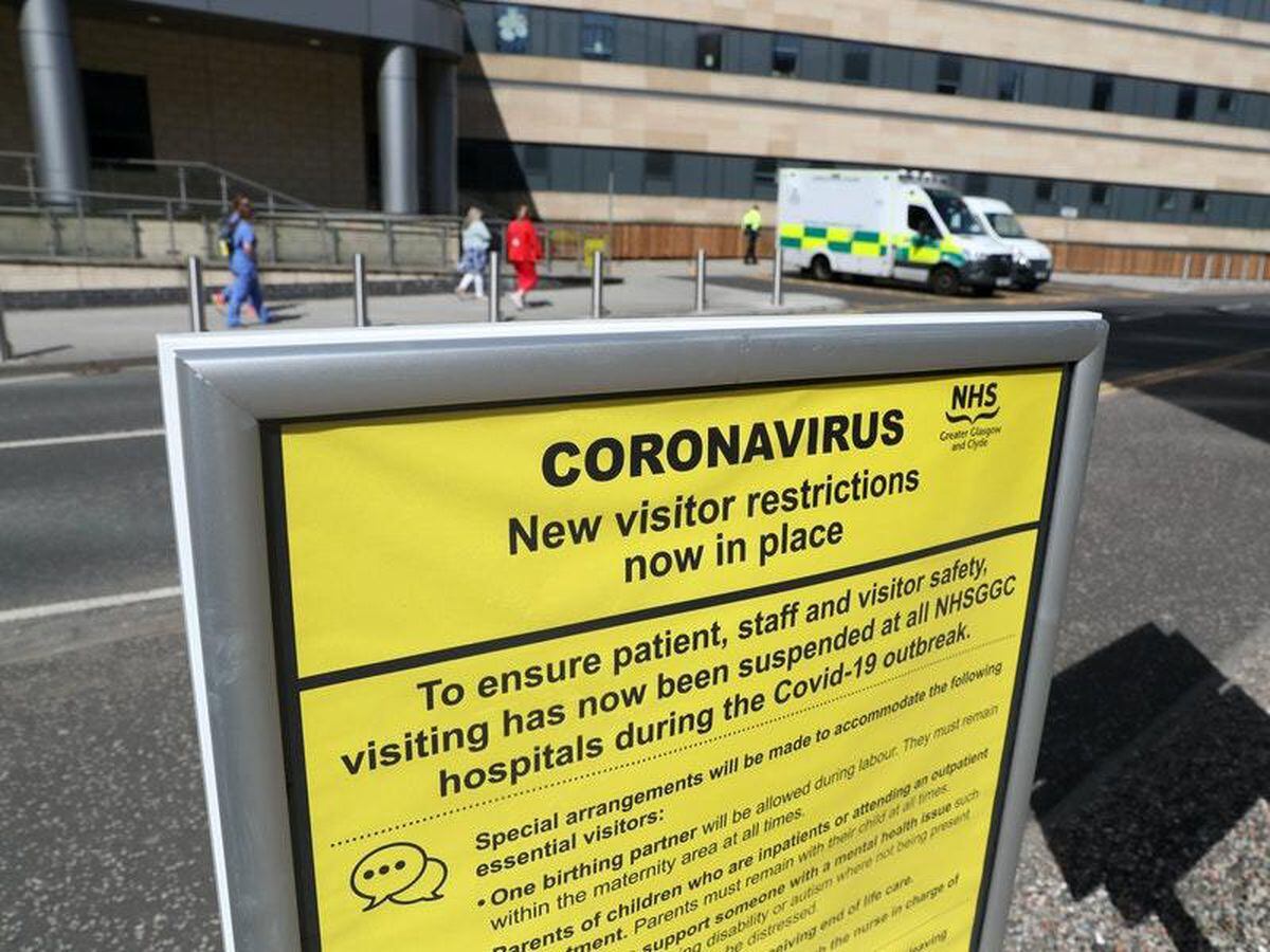 Queen Elizabeth University Hospital visitor restrictions sign