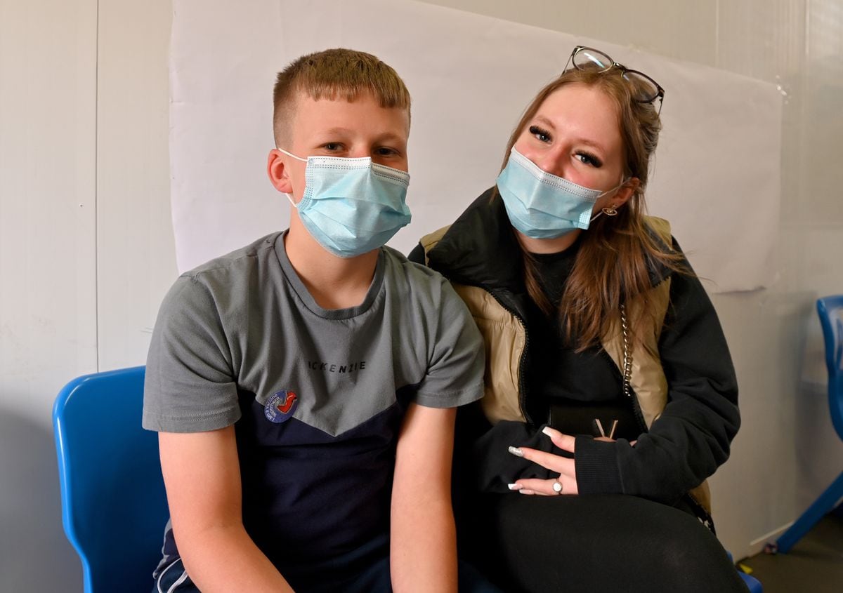 Jacob Robins said he had overcome a fear of needles to get his first jab. He was sat with his sister Abigail