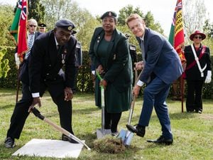 Caribbean War Monument Charity chairman Winston White, deputy chair Pauline Milnes and Mayor of the West Midlands Andy Street break the ground on the site of the monument