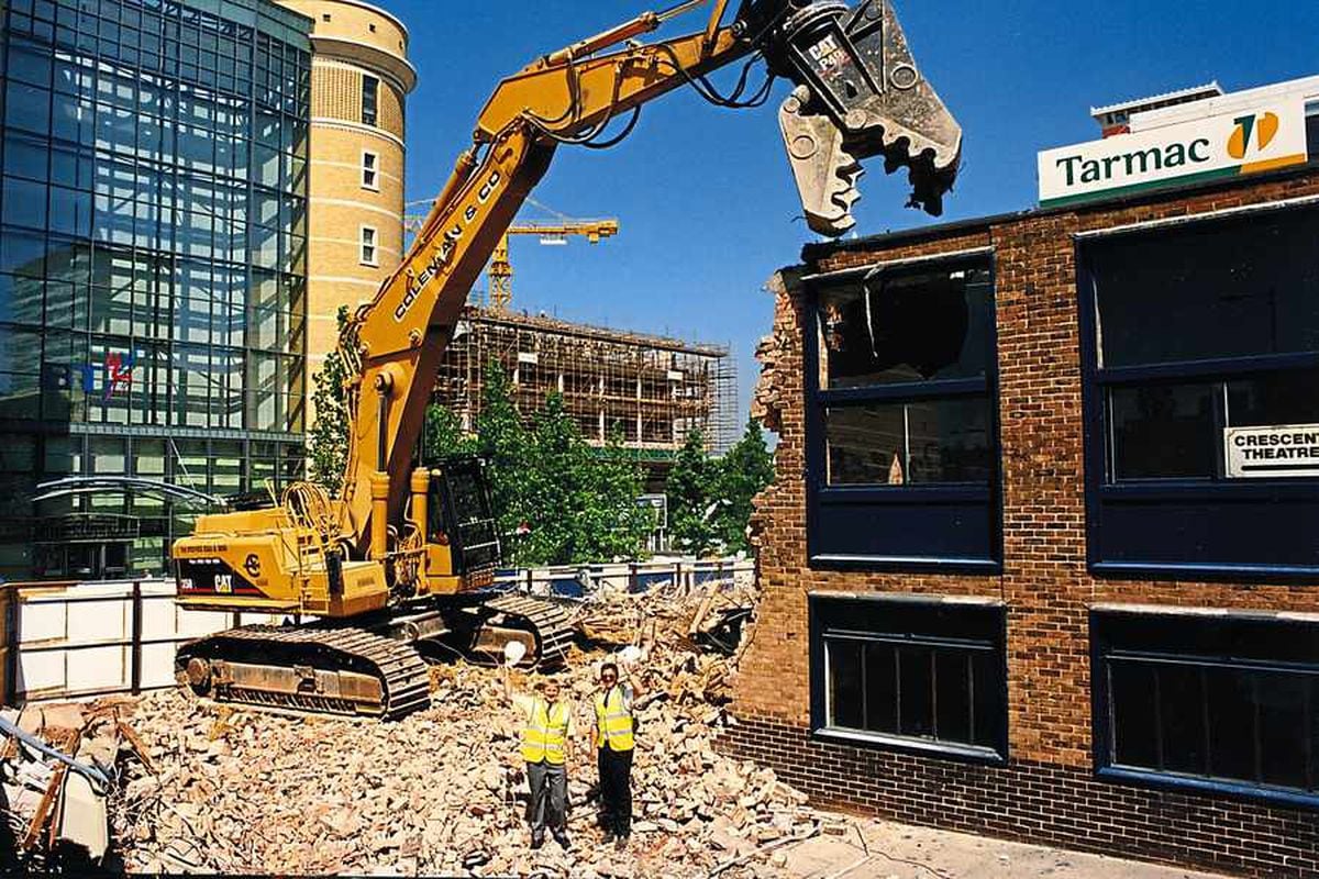 Work stars demolishing buildings in the huge project which began in 1993