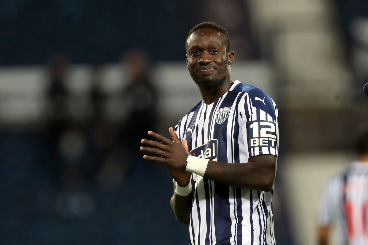Mbaye Diagne of West Bromwich Albion applauds the West Bromwich Albion Fans at the end of the match.