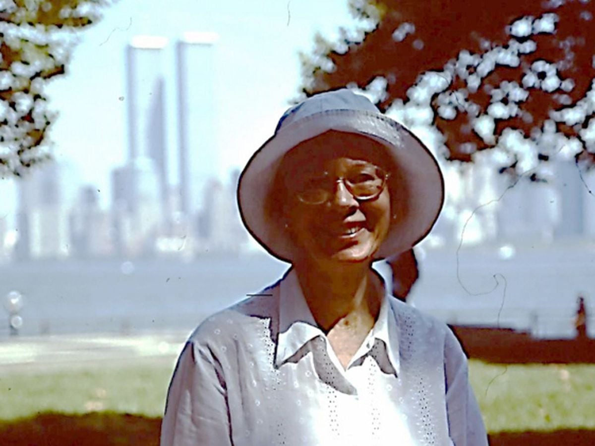Orleana Cattell of Wolverhampton during her New York trip in September 2001, with the twin towers in the background.