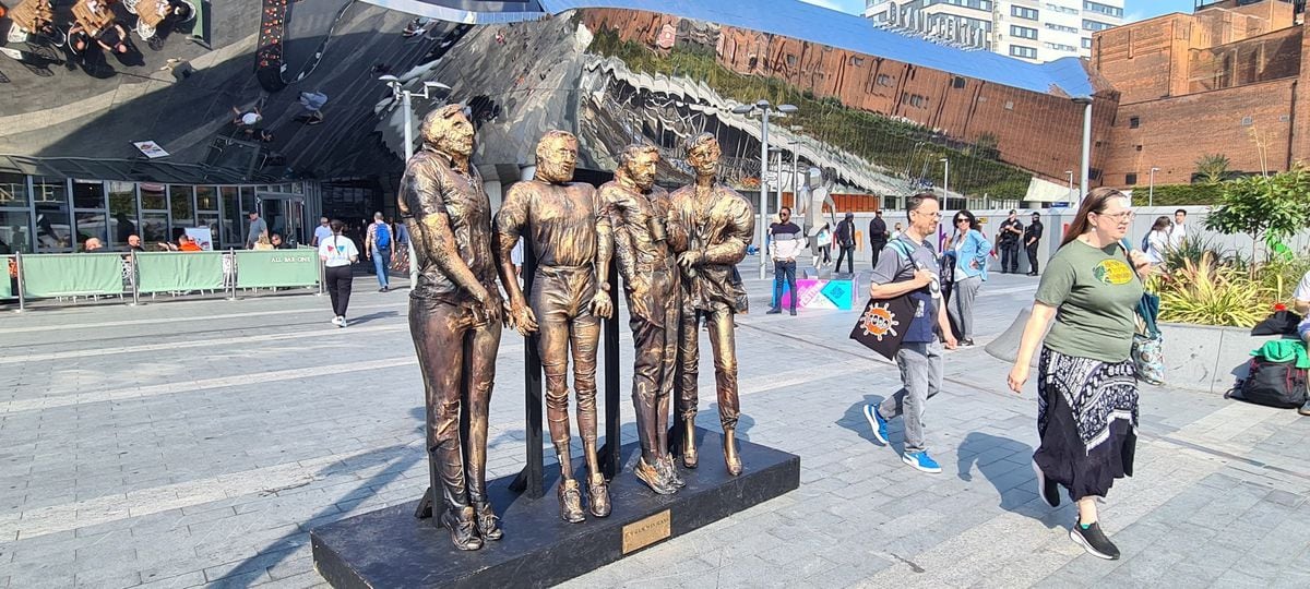 "Four Lads In Jeans" by artist Tat Vision. Photograph Courtesy: Urban Pictures. 
