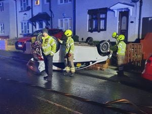 Crews were called to an overturned car on Bunn's Lane in Dudley