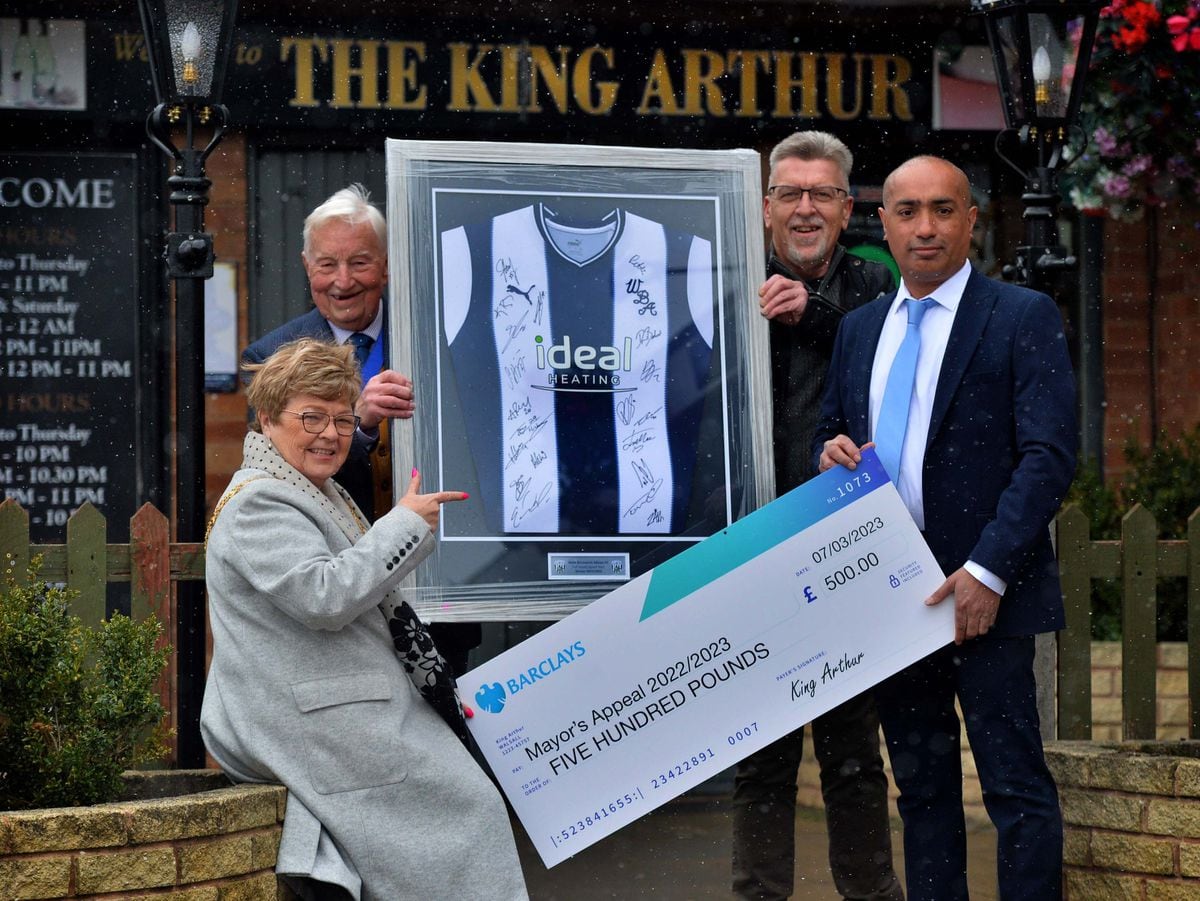 Pictured from left, The Mayor Of Walsall Councillor Rose Martin, her consort Jim Martin, Albion fan and loyal customer Paul Blick and owner of The King Arthur, Kam Chohan