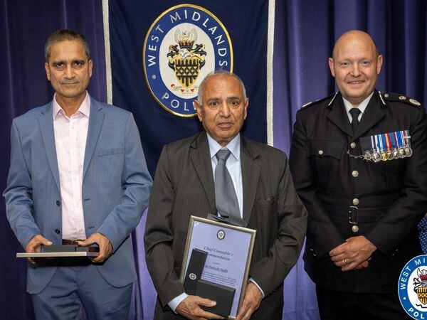 Radhey Yadav and Om Parkash Malhi pictured with Chief Constable Craig Guildford