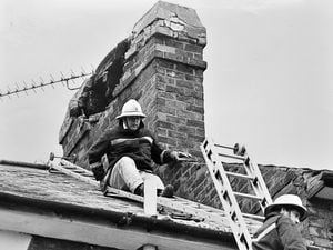 Firefighters making a damaged chimney safe in Victoria Street, Shrewsbury following the 1990 earthquake